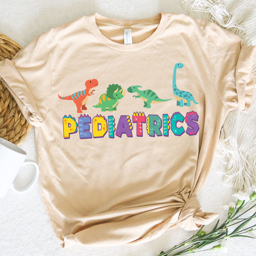 Pediatric Nurse Graphic Tee Dinosaurs Pediatrics