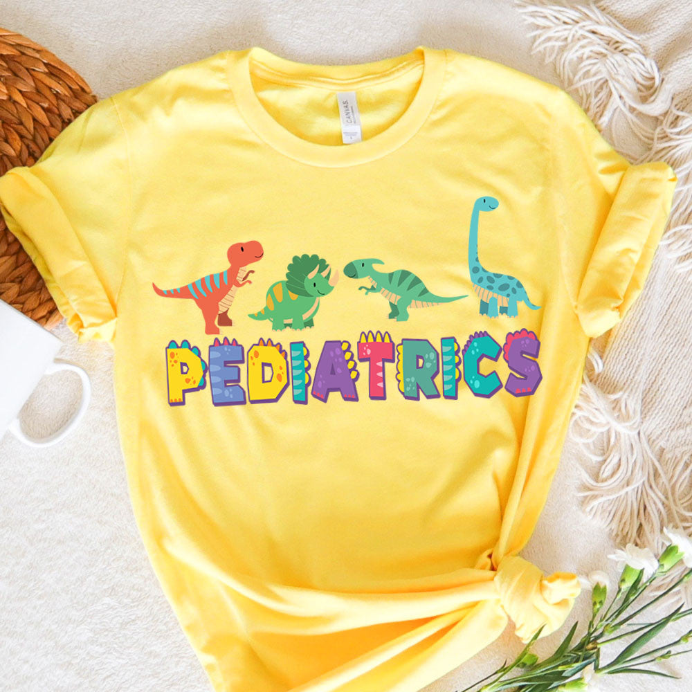 Pediatric Nurse Graphic Tee Dinosaurs Pediatrics